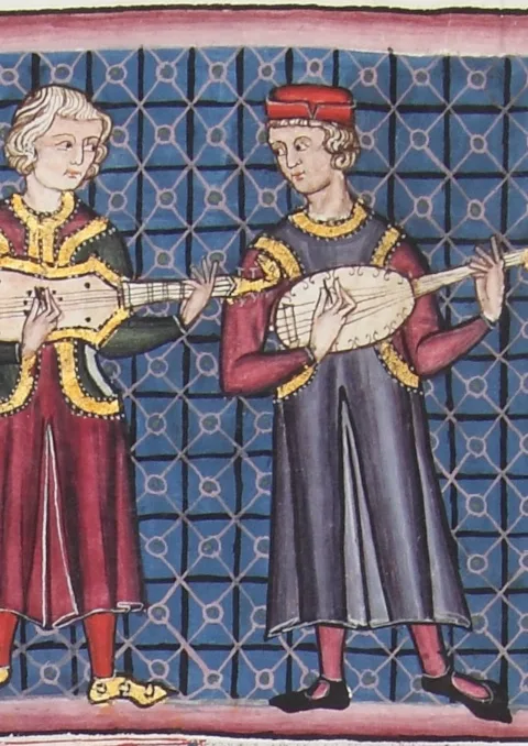 Two musicians playing early guitars, from the Cantigas de Santa Maria.